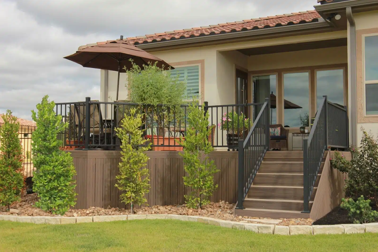 Flowers And Greenery planted around deck