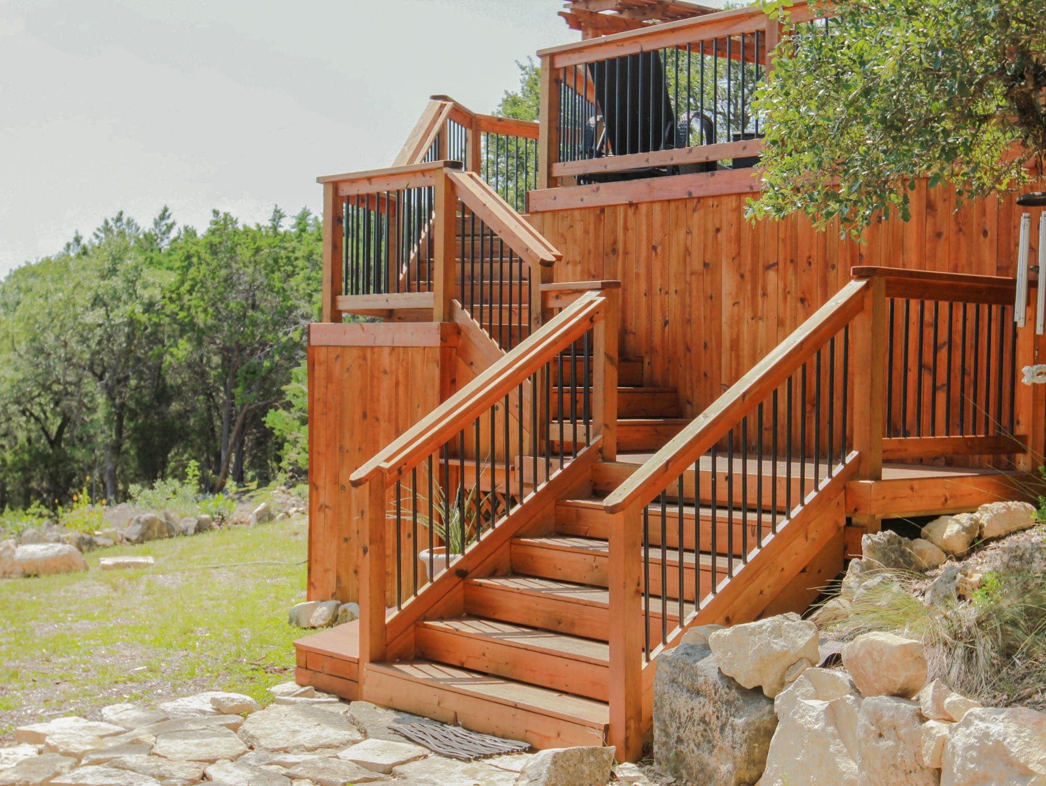 Steel-rod-railings Composite Decking stairs with lights in San Antonio
