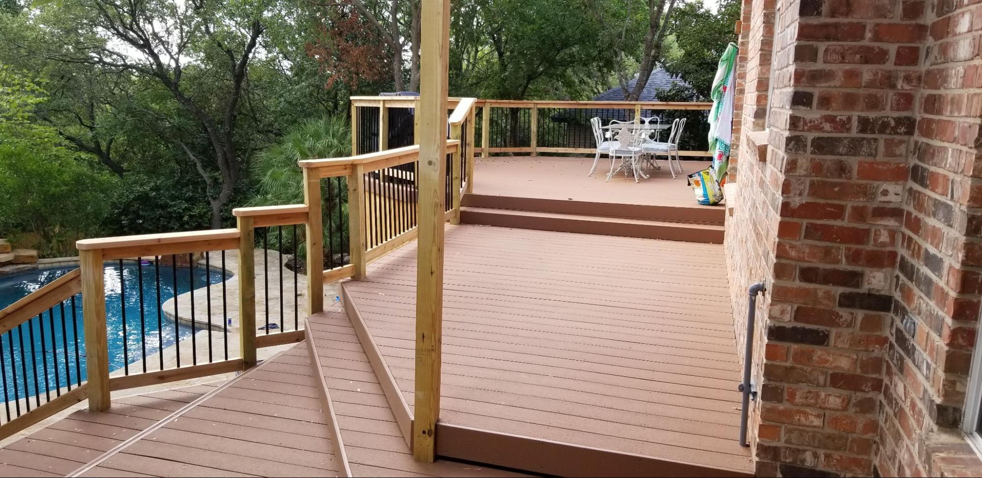 image1 Deck seating arrangement with integrated benches, sofa, and chairs